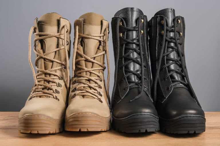 Two pairs of tactical boots, one brown and one black Two pairs of tactical boots, one brown and one black