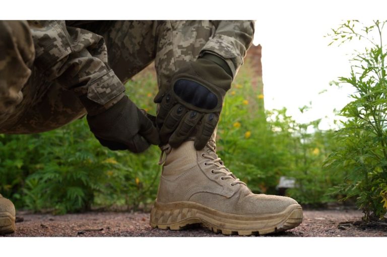 Man wearing tactical boot Man wearing tactical boot