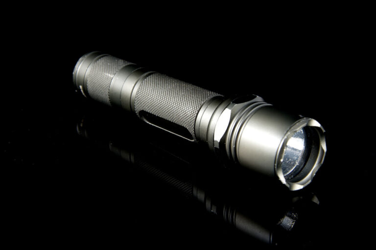 Black tactical flashlight Black tactical flashlight