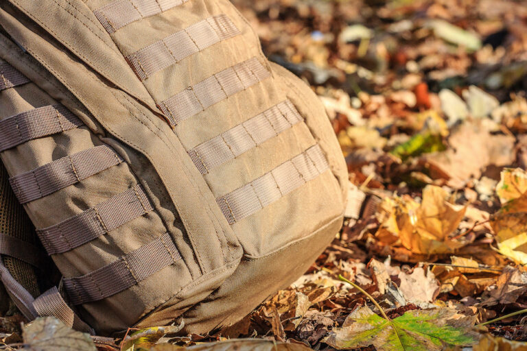 Close-up view of brown tactical backpack Close-up view of brown tactical backpack