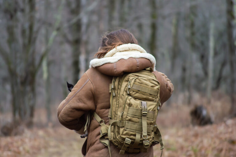 Person wearing a tactical backpack